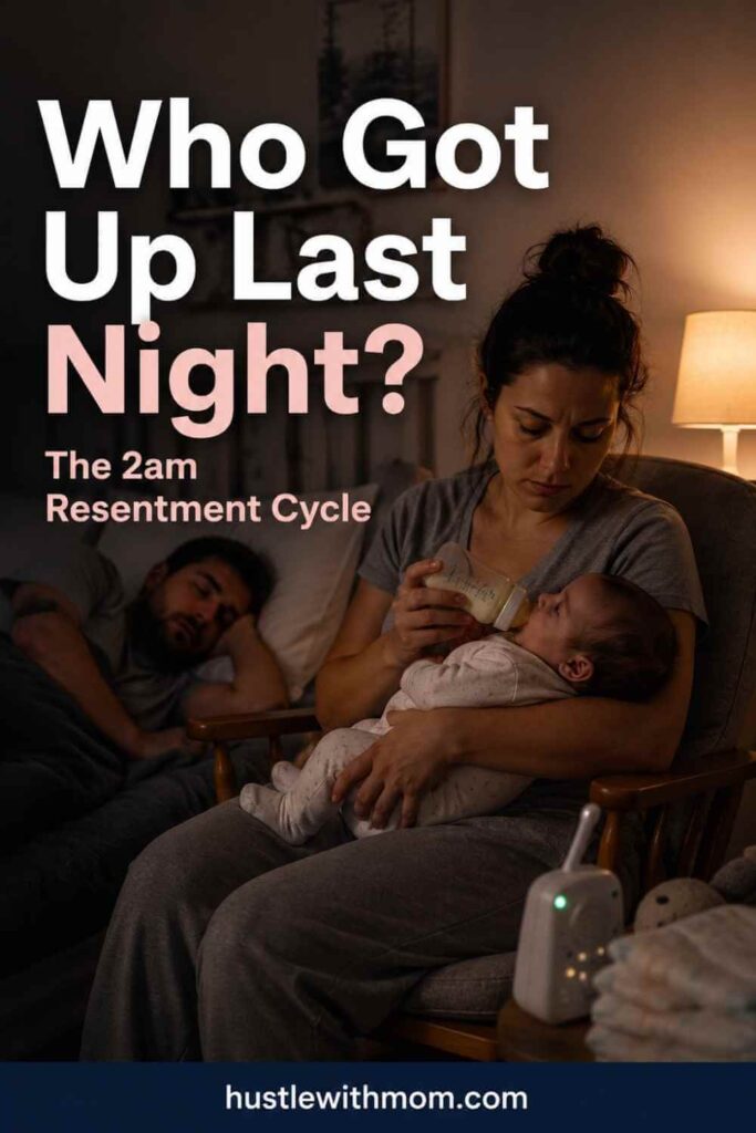 One parent caring for a baby during a nighttime feeding while the other sleeps nearby.