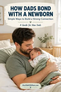 New father gently holding his newborn baby at home while learning how to build a strong father-baby bond.